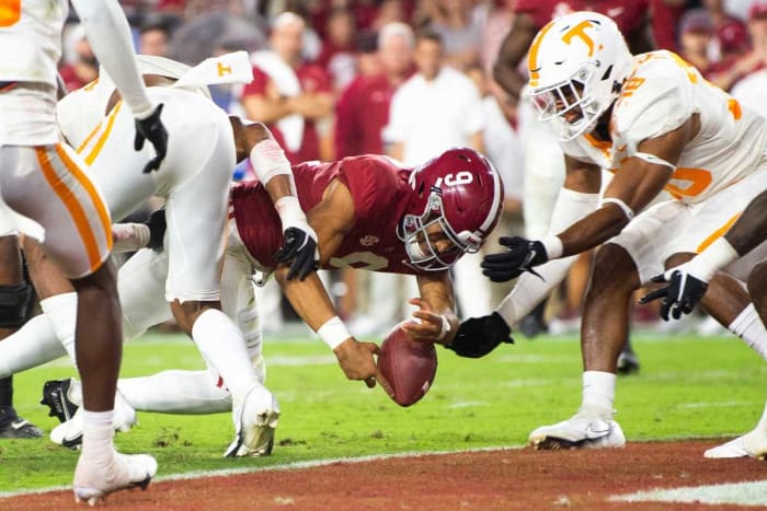 Alabama quarterback Bryce Young reaches across the goal-line but loses the ball against Tennessee